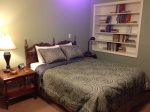 Upstairs master queen bedroom.  Owner is an avid reader and shares his favorite books guest access.